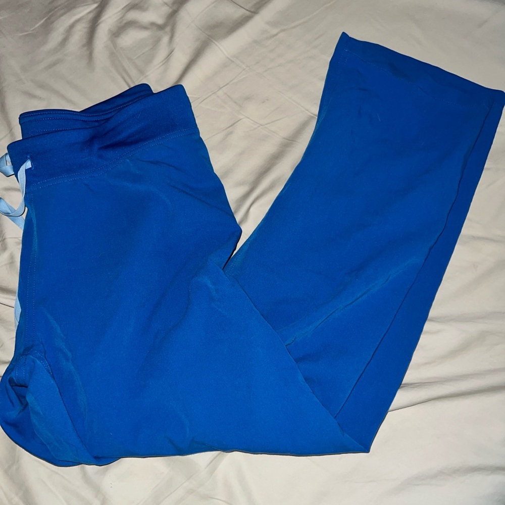 Figs pants. Color is royal blue. Size small petite. Great condition.